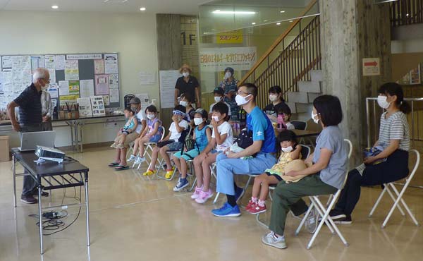 Children and their parents participating in a learning program as part of the Dunlop Environmental Class